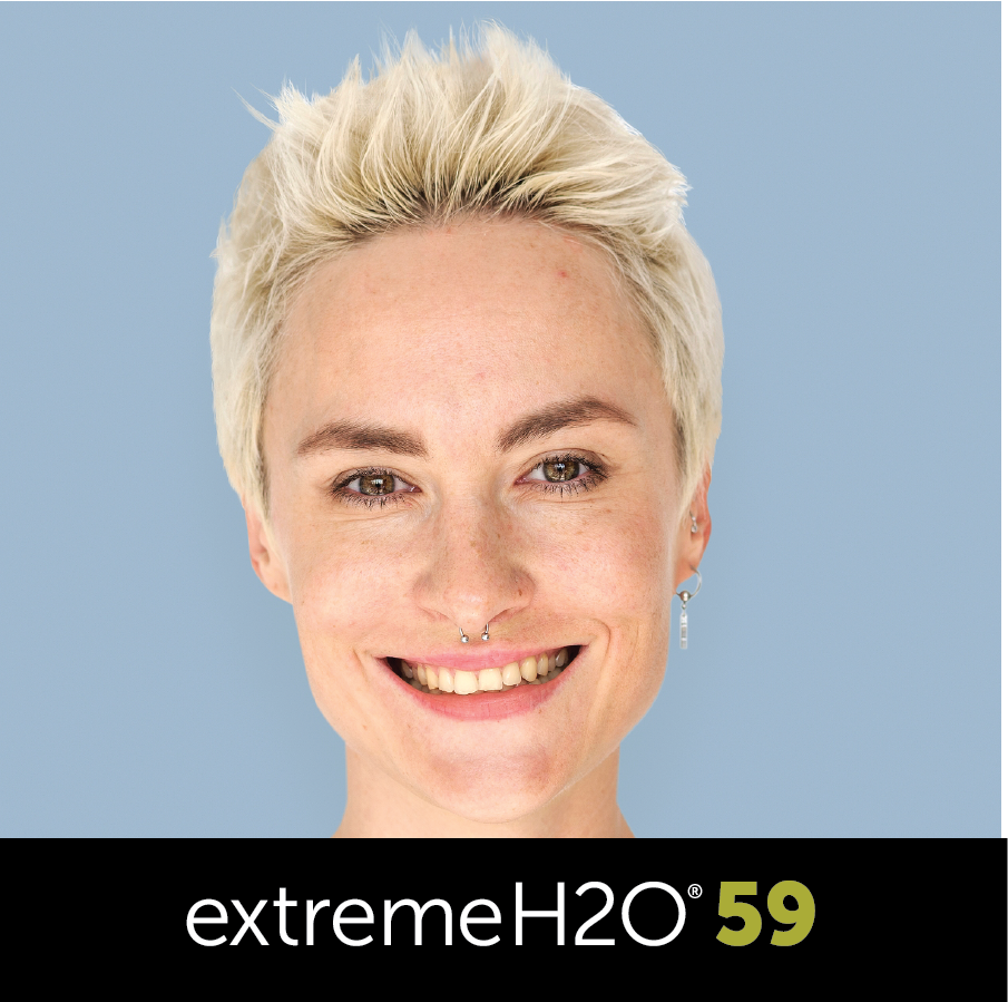 Hip woman with short blond hair and pierced nose wearing Extreme H2O 59 contact lenses